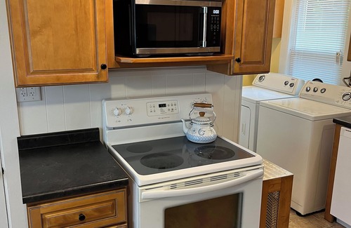 Southern Coast Condo | Family friendly serene house close to beaches, sleeps 8, lot off street parking