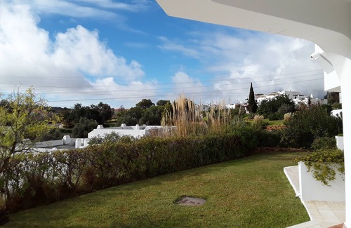 Alpouvar Apartment | Family ground floor sth faceing garden apartment with unobstructed views n