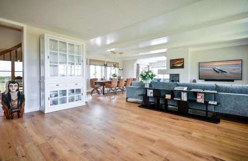 List House | Ferienhaus One Sylt - Traumhaus unter Reet, zwischen Wattenmeer und Nordsee