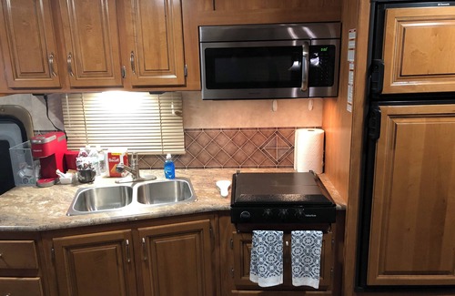 Hereford House | Find Serenity In Our Fully Stocked Class A RV