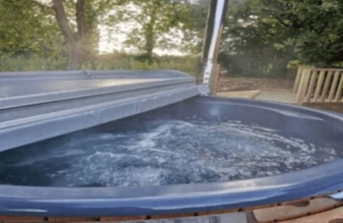 Milton Cabin | Fox Lodge at Heygates Lodging - Waterfront Wooden Lodge With hot tub