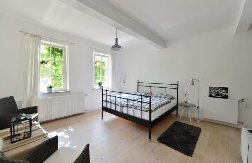 Weisenheim am Sand House | Gästehaus & Weingut GEHRIG