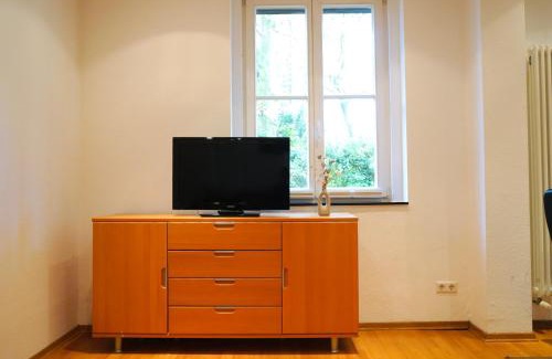 Stadtmitte Apartment | Gartenblick Apartment-Terrasse-Parkplatz- Waschmaschine-Garten