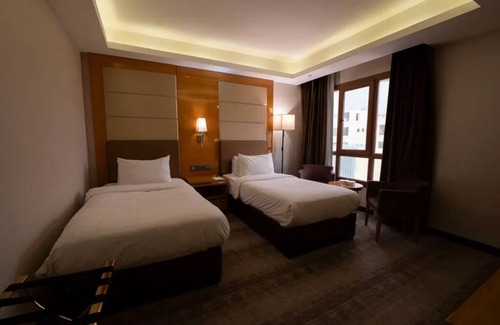 Suwailih Hotel | Gloria Hotel | 2 Deluxe Double or Twin Room | Relaxing Stay with Terrace Access