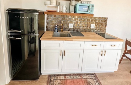 Alpine Cabin | Glow House - A Modern Container with a Stargazing Deck on Top.