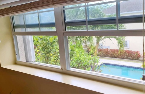 Bodden Town Condo | Golden Palms Private Queen Suite & Pool - Solo Traveller Paradise