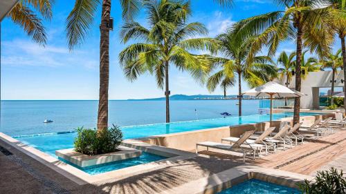 Las Glorias Apartment | Gorgeous 1BR Condo with Pools & Sea Views