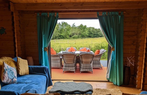 Llanfairpwllgwyngyll Cabin | Gorgeous green log cabin at one with nature on Isle of Anglesey