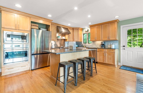 North Lake George House | Gorgeous lakeview retreat with wraparound porch, wood stove, & WiFi - dogs OK
