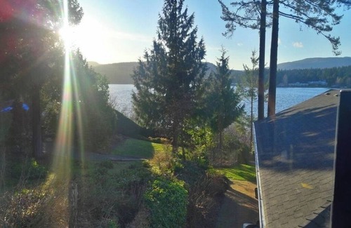 Shawnigan Lake House | Gorgeous Shawnigan sunsets from hot tub & dock