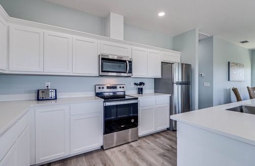 Aransas Pass House | Gorgeous side-by-side beach houses with furnished decks, AC, & full kitchens