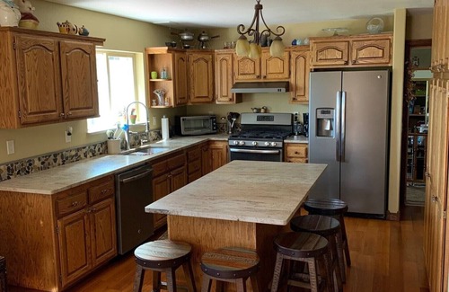 Sandpoint House | Gorgeous Waterfront 5 Bedroom House with Private Dock & Beach