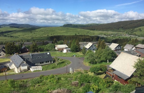 Besse-et-Saint-Anastaise Apartment | Grand Studio Superbesse breathtaking view of the Cantal mountains