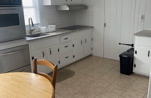 Stone Harbor House | Great location. This ranch style duplex features two bedrooms and one bath. Window air conditioning and nice patio with gas grill, table and chairs. Off street parking. Just a short stroll to the beach and all that Stone Harbor has to offer! Pe