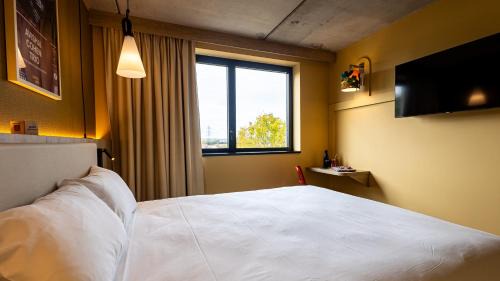 Muire - Haubette Hotel | greet Hotel Reims Tinqueux