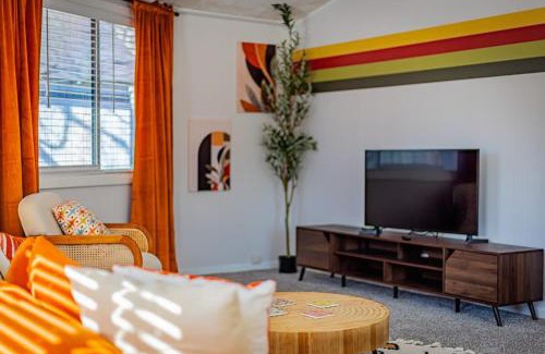 West End House | Groovy Getaway with Fenced Yard