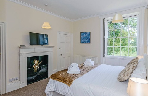 Wisbech Cottage | Ground floor: Three living areas, two with open fire, TV with Freeview/DVD.