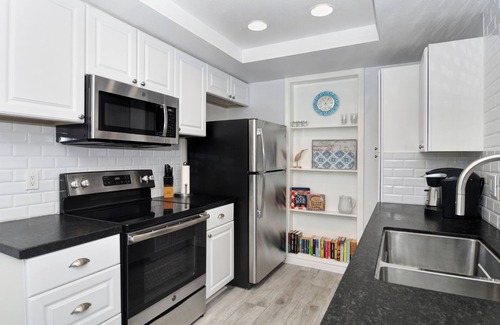 Del Obispo Condo | Harbor Cove-Pool View with Creek! Walk to Beach & Harbor! Lower Unit-No Stairs!