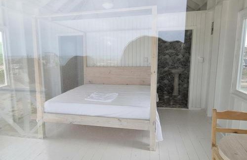 Codrington House | Harrys Cottages Cottage 5 right on the pink sand