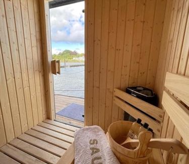 Schleswig Boat Rental | Hausboot Fjord Schleiliebe mit Biosauna und Dachterrasse in Schleswig