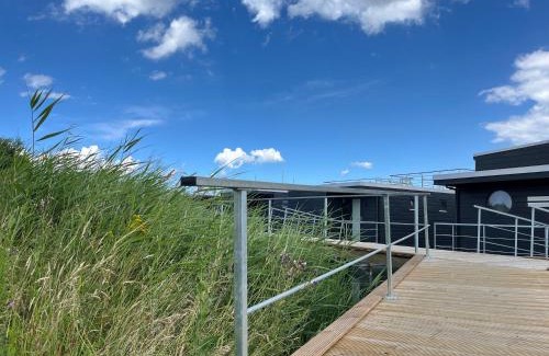 Wangerland Boat Rental | Hausboot-See-Rad-SUPs-Meer-Familie-Urlaub!