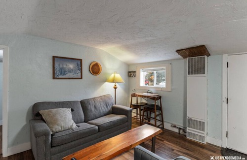 North Star Cabin | Historic cottage - 10 minute walk to restaurants & trails