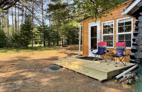 Chetek Cabin | Historic log Cabin Hideaway on a Quiet Clear Lake