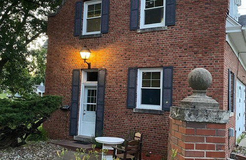 Bloomfield Apartment | Historic Steckel carriage house with picturesque landscaping