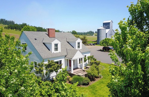 Dayton House | Historic Vineyard Escape, with patio and vintage charm.