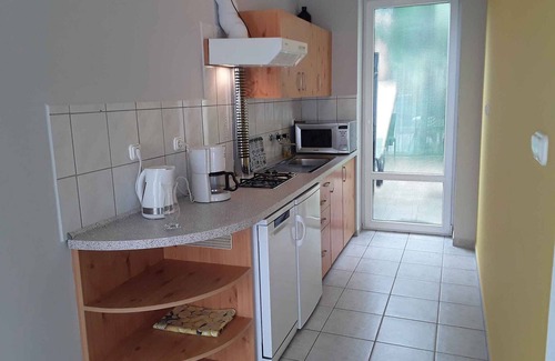 Szantod House | Holiday home only 80 m from the private beach, with a small boat and air conditioning