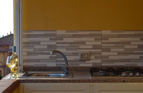 Buggerru House | Holiday Home 'Sole E Mare Buggerru - Appartamento' with Sea View, Private Terrace and Air Conditioning