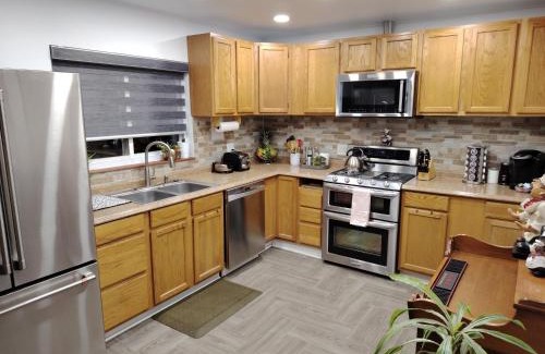 Fort Logan House | Home with Garden 3BR Perfect Family & Groups