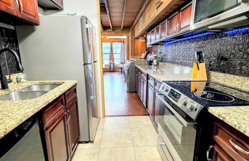 Vacation Village House | Hook's Cabin- Lake & Pool near Disney A-frame