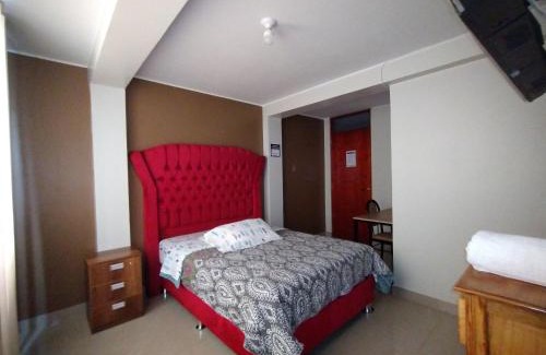 El Tambo House | HOSTAL TOSCANO SUITES