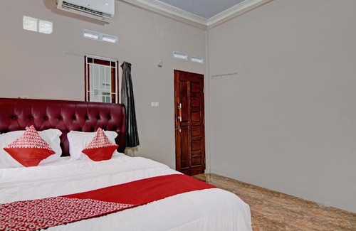 Pekanbaru Hotel | Hotel O Putri Homestay Syariah Near SPBU 14.282.694 (Air Hitam)