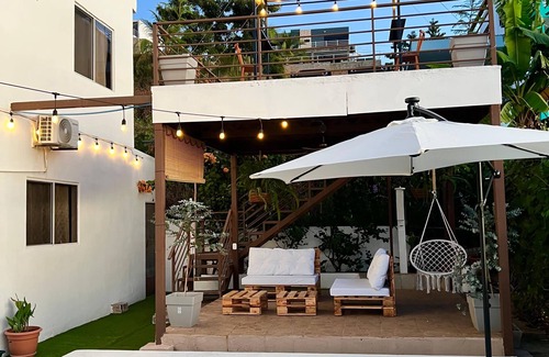 Santa Tecla House | house with a beautiful sea view in enchanting SurfCity with WiFi, AC and Pool.