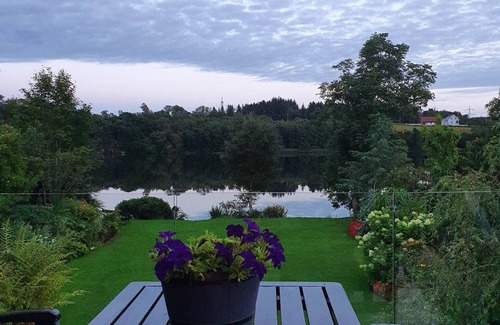 Sandnes Villa | House with big garden by water
