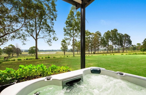 Quorrobolong Cabin | Hunter Hideaway Farm cozy cabin for two with hot tub outside the door.