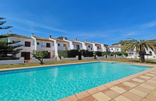 Molinell Ski Chalet | Ibiza-style vacation home with terrace right on the beach. Great pools.