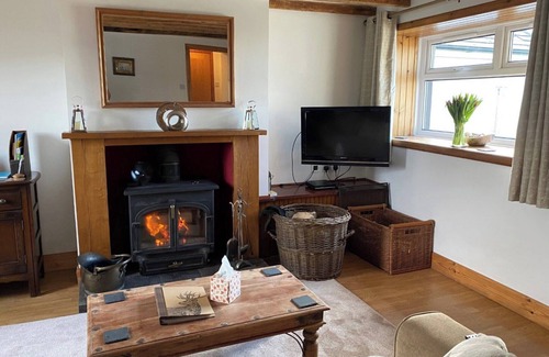 Bankend Cottage | Ideal single-storey retreat with cosy wood burner.