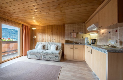 Moso in Passiria Apartment | Idyllic Holiday Apartment Wasserfall Jogglanderhof with Balcony