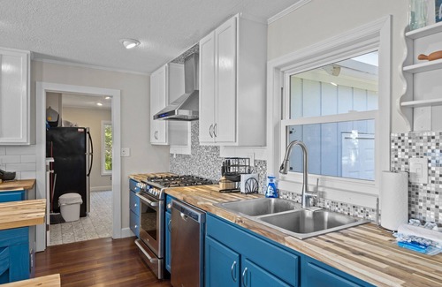 Morehead City House | Idyllic waterside home with a hot tub, open-concept layout, W/D, & central AC