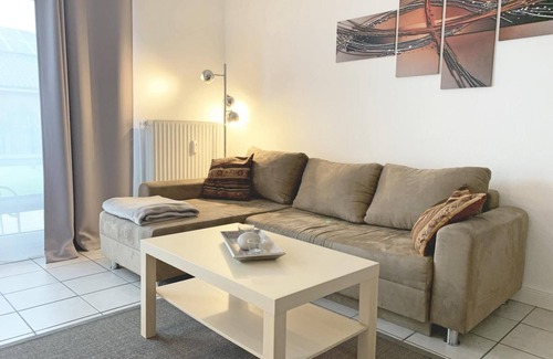 Kronsgaard Apartment | In Kronsgaard, only 1 km from the Baltic Sea beach, the cozy vacation apartment "Strandgold" awaits you, with a fenced garden for your four-legged friend, to enjoy your well-deserved vacation far away from the stress of everyday life
