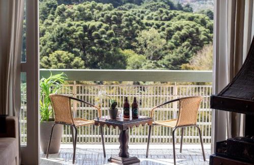 Vila Iara Apartment | Incrível Vista no Capivari com 4 Quartos e Lareira