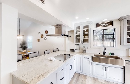 St. Augustine South House | Inviting home with pool, full kitchen, enclosed yard, firepit, central AC, & W/D