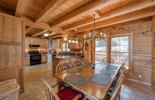 Huddleston Cabin | Inviting waterfront cabin with hot tub, kayaks, and beautiful sunsets