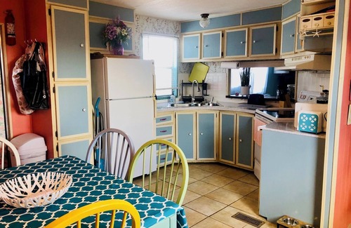 Flamingo Bay House | ISLAND TIME! DOCK! POOL! KAYAKS! BOAT To BEACH! PETS ALLOWED!