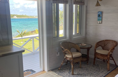 Dunmore Town Cottage | Islander Turtle Peek - Stunning new waterfront tiny-cottage overlooking harbour