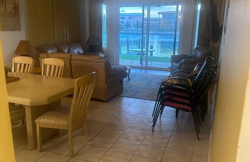 Bahamia West House | It's Island Time! Large condo with dock and a view in the heart of Freeport.