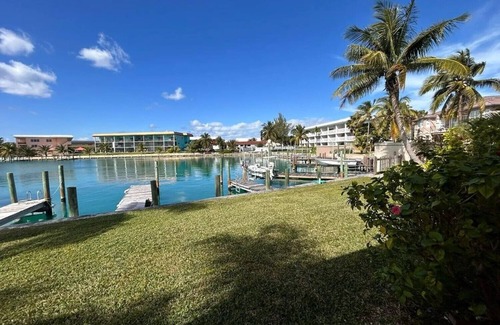 Bahamia West House | It's Island Time! Large condo with dock and a view in the heart of Freeport.